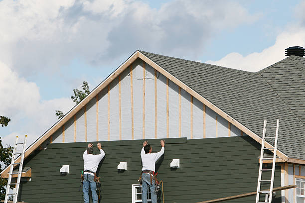 Professional Siding Contractor technician working in Wellsville, OH